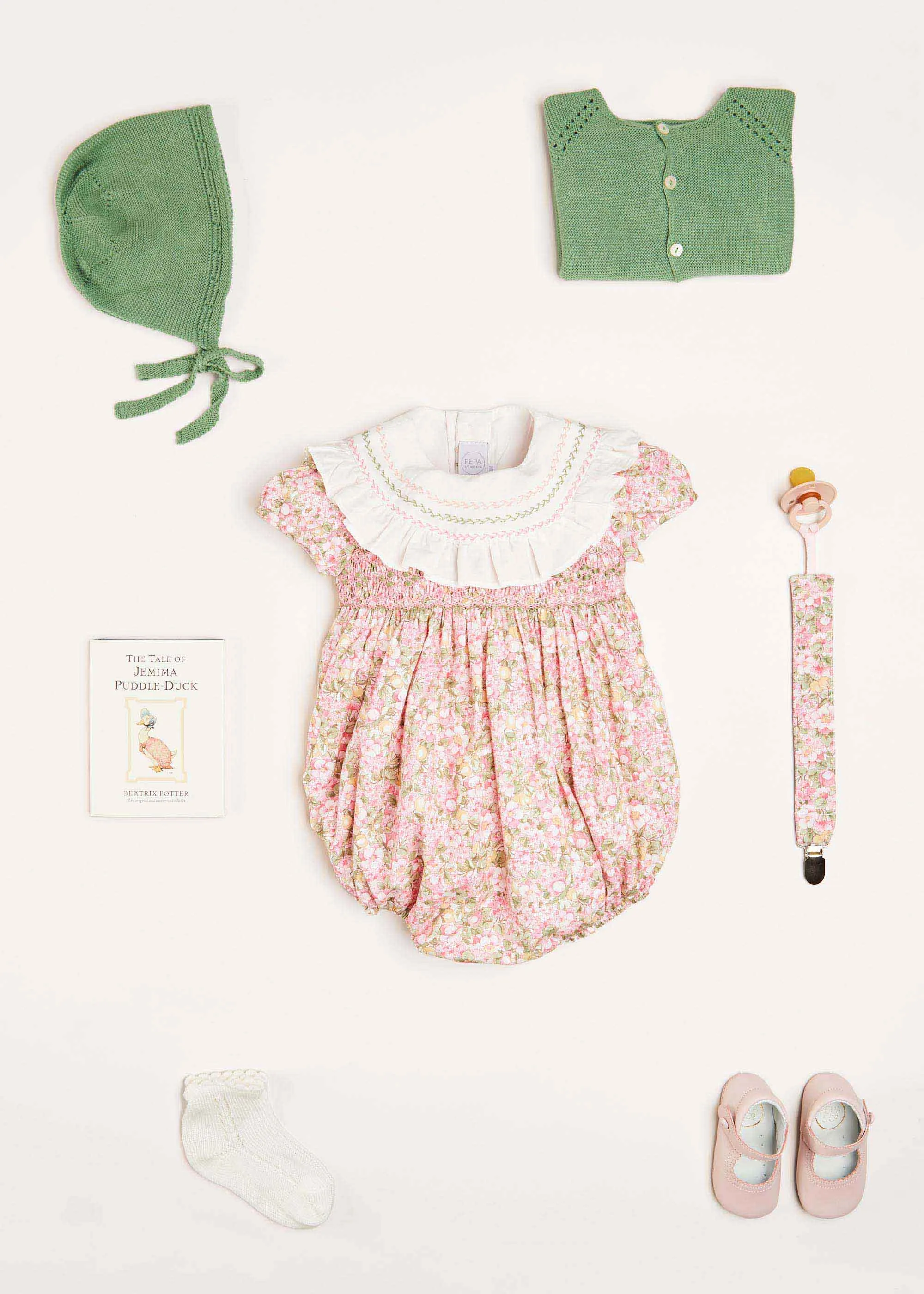 Eloise Floral Print Handsmocked Short Sleeve Romper in Pink (6mths-2yrs)