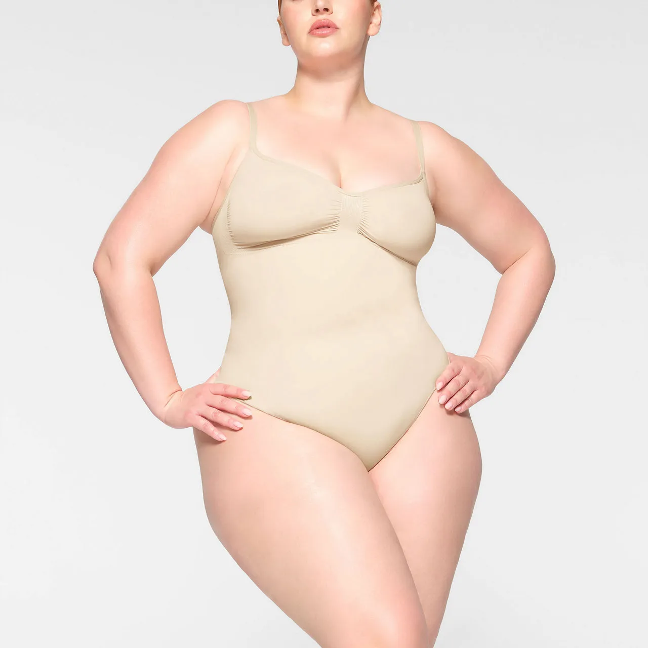 SKIMS SEAMLESS SCULPT Thong Bodysuit Sand - Nude